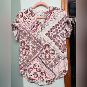 Blouse xs on tag but will fit to medium. Soft and flowy